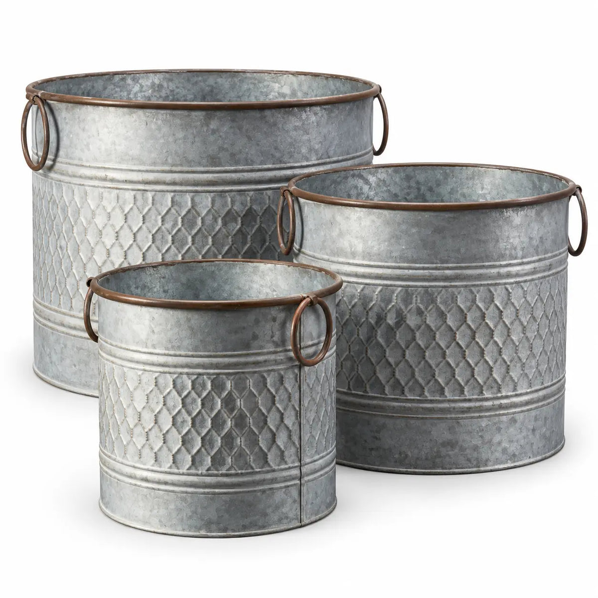 Three empty rustic zinc honeycomb planter pots in graduated sizes with brown ring handles on a white background
