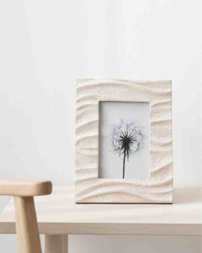 Natural textured photo frame by Satchville, showcasing a stylish home decor piece with a rustic finish and intricate surface details.