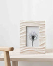 Natural textured photo frame by Satchville, showcasing a stylish home decor piece with a rustic finish and intricate surface details.