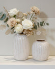 White ceramic vase with trailing leaf print, Satchville home decor piece, medium size, elegant and decorative for interior spaces