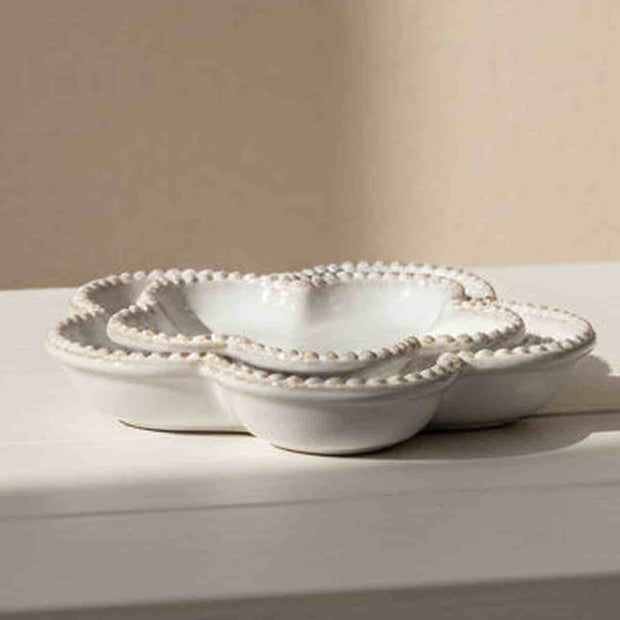 Natural ceramic flower-shaped plate with bobble rim, ideal for home decor, by Satchville, showcasing intricate design and craftsmanship.