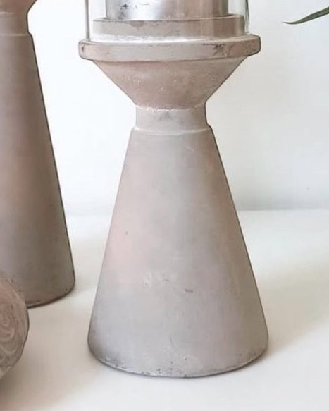 Small stone hurricane tealight candle holder by Satchville, showcasing a rustic home decor piece with a textured stone finish.