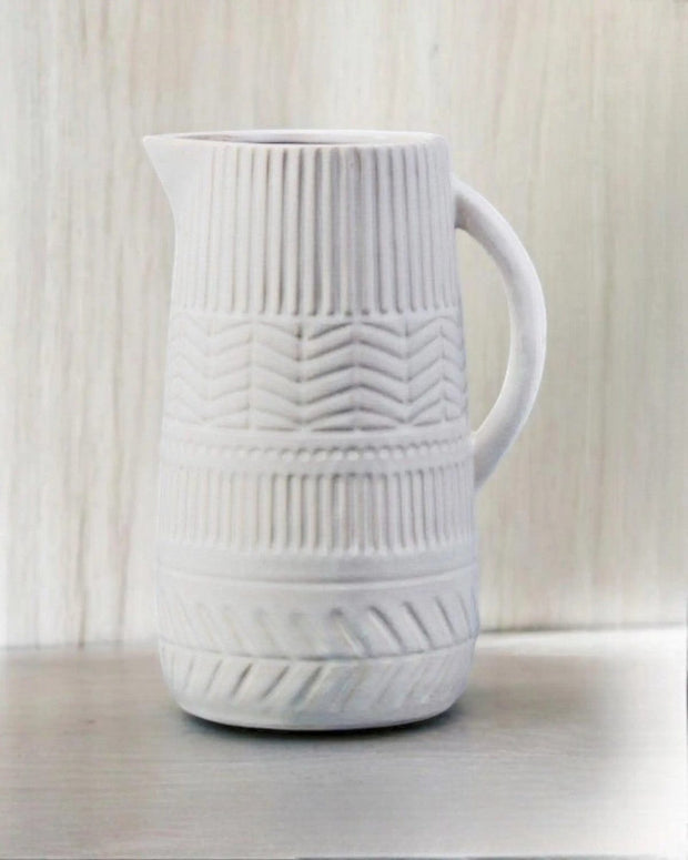 White Aztec ceramic jug by Satchville for kitchen and dining, featuring intricate Aztec patterns and a smooth ceramic finish.