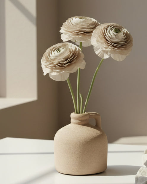 Beige textured bottle-shaped vase by Satchville, featuring a narrow neck and rounded base, ideal for modern home decor.