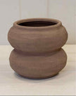 Brown textured sculptured vase by Satchville, featuring intricate patterns and a rounded shape, perfect for home decor.