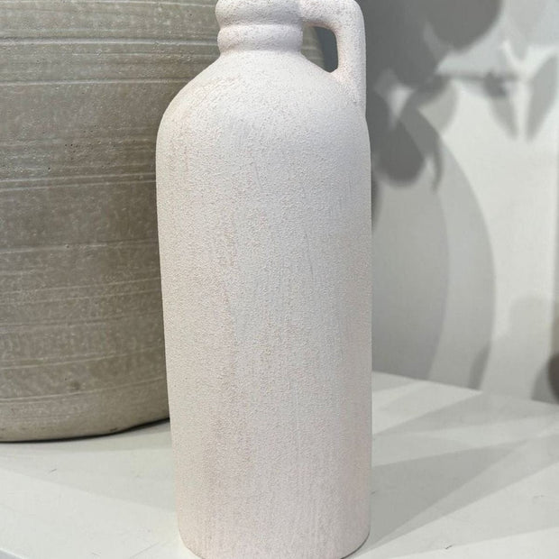 Tall white textured vase by Satchville, featuring a sleek cylindrical shape and decorative surface design.