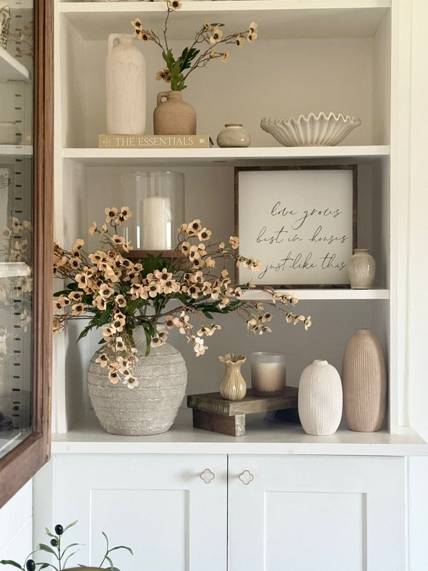 Tall white textured Satchville vase with a sleek, modern design, perfect for displaying flowers or decorative arrangements.