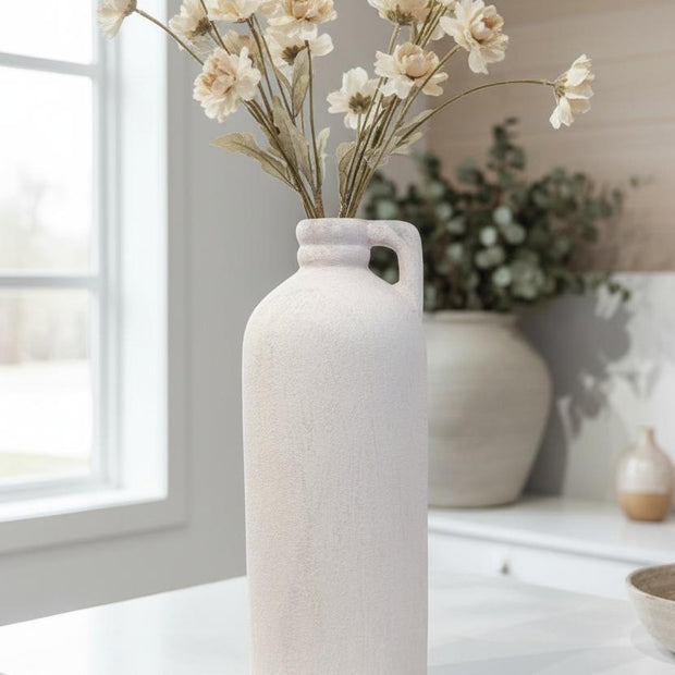 Tall white textured vase by Satchville, featuring a sleek cylindrical design and subtle surface pattern.