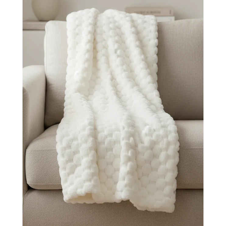 Ivory white Malini Sculpted Faux Bunny Rabbit Throw Blanket made of soft furnishings material, featuring a textured bunny design.