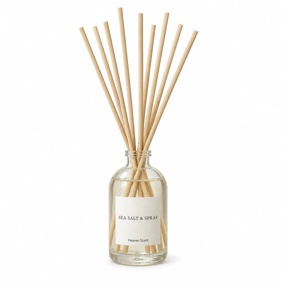 Heaven Scent SEA SALT & SPRAY 100ml reed diffuser on white with natural reeds inserted.