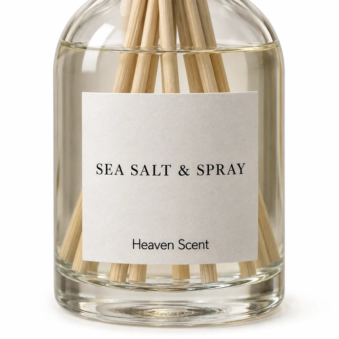 Heaven Scent SEA SALT & SPRAY 100ml reed diffuser close-up of the fragrance label and glass bottle.