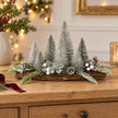 Silver Fir Christmas Tree Decoration by Heaven Sends against a festive background