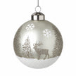 Silver glass winter scene bauble with glitter stag and fir trees on a white background