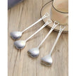 Silver Heart Handle Spoon from Starlight Express, a stylish kitchen and dining utensil with a heart-shaped handle.