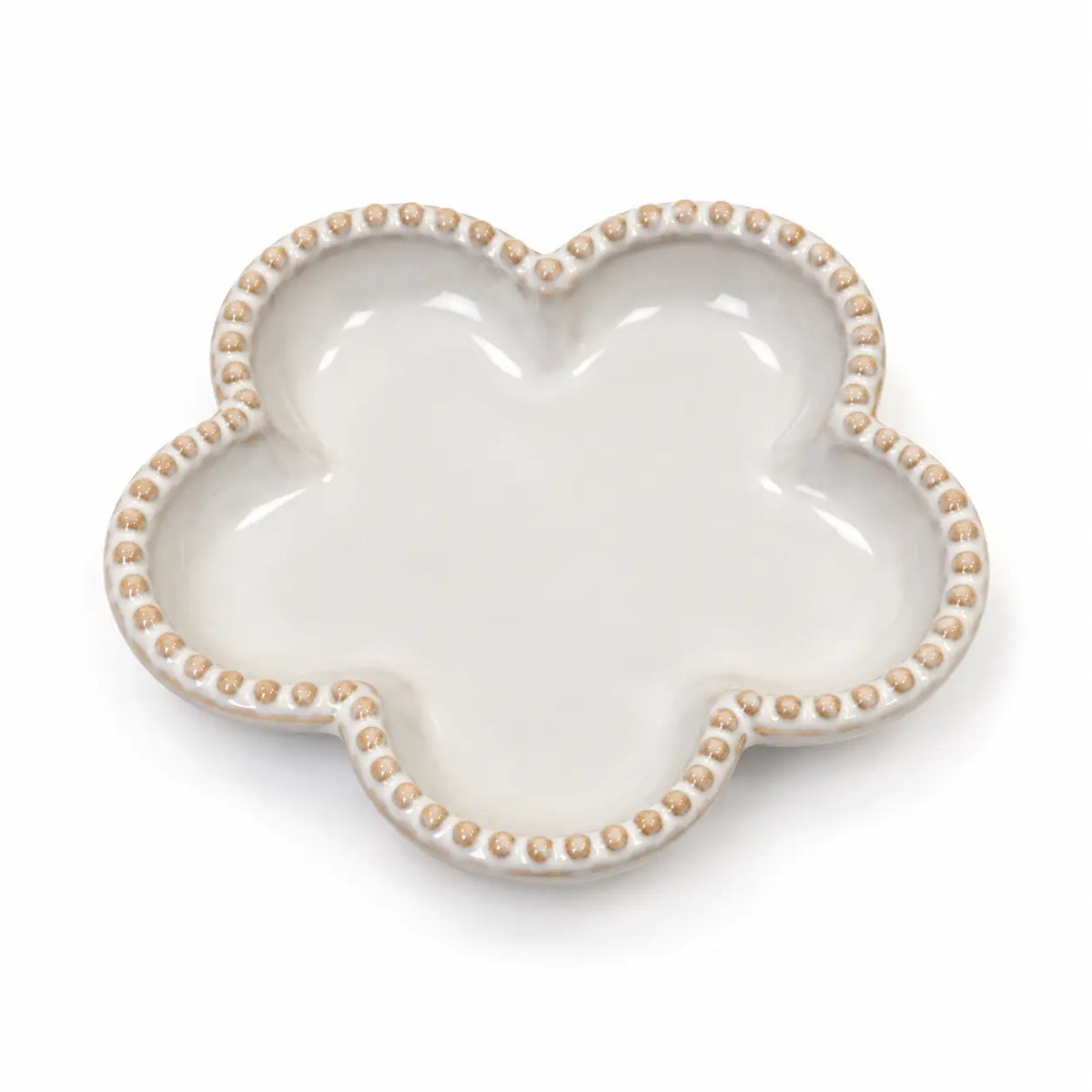 Small ceramic flower-shaped plate with bobble rim isolated on a white background