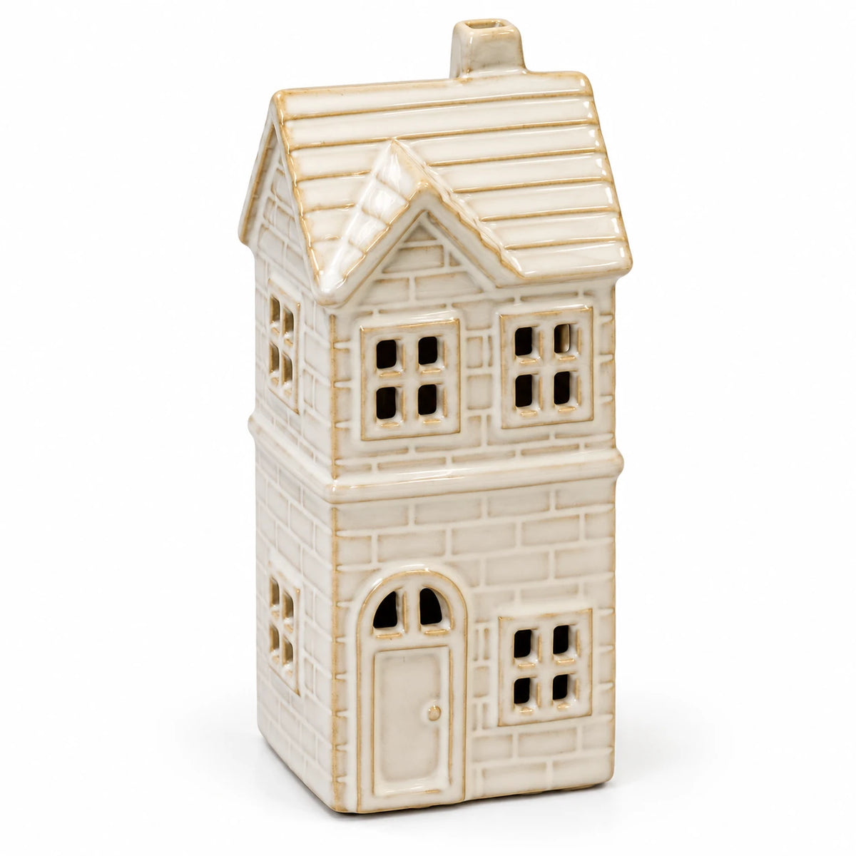 Close view of the ivory glaze and brick detail of the unlit ceramic LED house