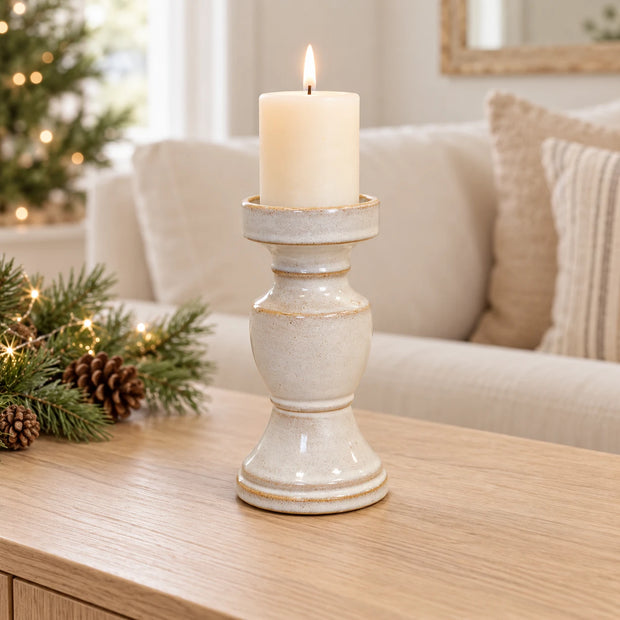 Small natural ceramic candle holder from Satchville, elegant and minimalist design for tabletop or console display.
