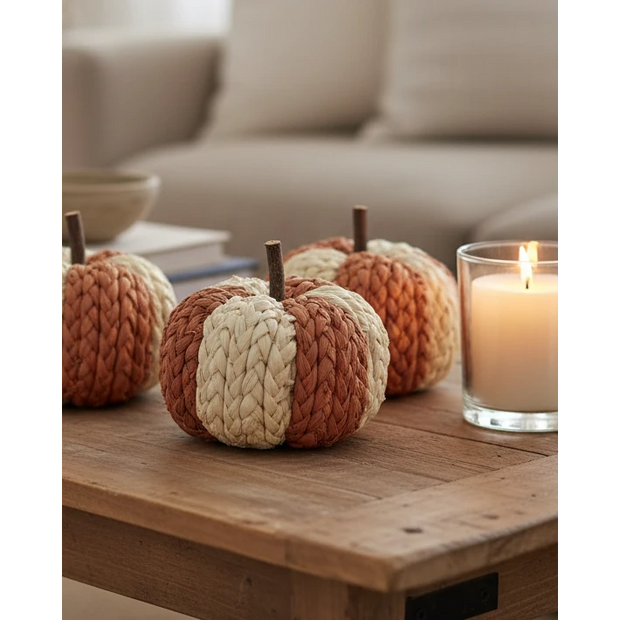 Small Natural Rafia Patterned Pumpkin, striped rust and cream woven pumpkins on a coffee table