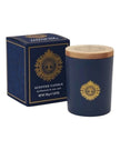 Navy blue candle from Somerset Toiletries Sandalwood Country Club collection with driftwood and seasalt scent on a wooden surface