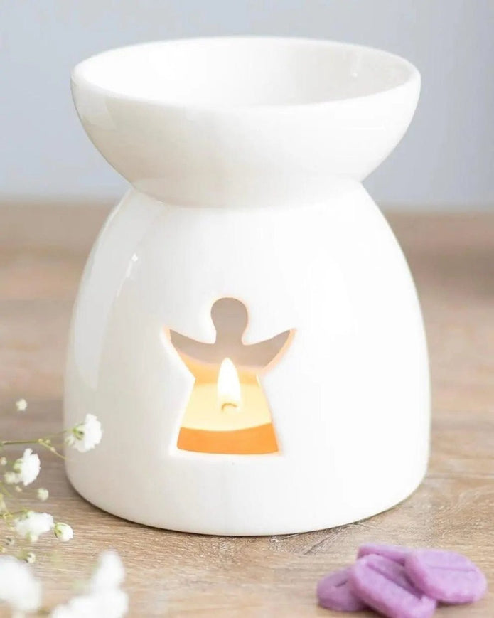 Angel cut-out wax burner from Something Different Wholesale, decorative wax melt warmer with angel design and intricate cut-out details.