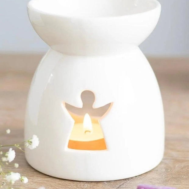 Angel cut-out wax burner from Something Different Wholesale, decorative wax melt warmer with angel design and intricate cut-out details.