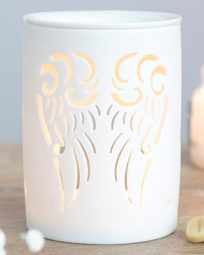 Angel wings cut out oil and wax burner from Something Different Wholesale, decorative wax melt burner with angel wing design.