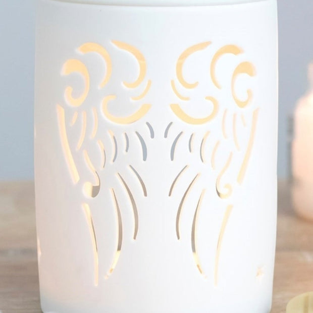 Angel wings cut out oil and wax burner from Something Different Wholesale, decorative wax melt burner with angel wing design.