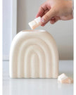 Cream arch wax melt oil burner, decorative ceramic wax melt warmer with a smooth curved design, by Something Different Wholesale.