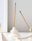 Cream speckle balancing stones incense stick holder for wax melt burners, featuring a decorative, hand-crafted design.