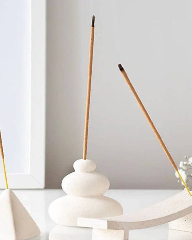 Cream speckle balancing stones incense stick holder for wax melt burners, featuring a decorative, hand-crafted design.