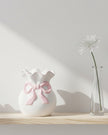 Pink Bow Wax Melt Burner from Something Different Wholesale, decorative ceramic warmer with pink bow design for scented wax melts.