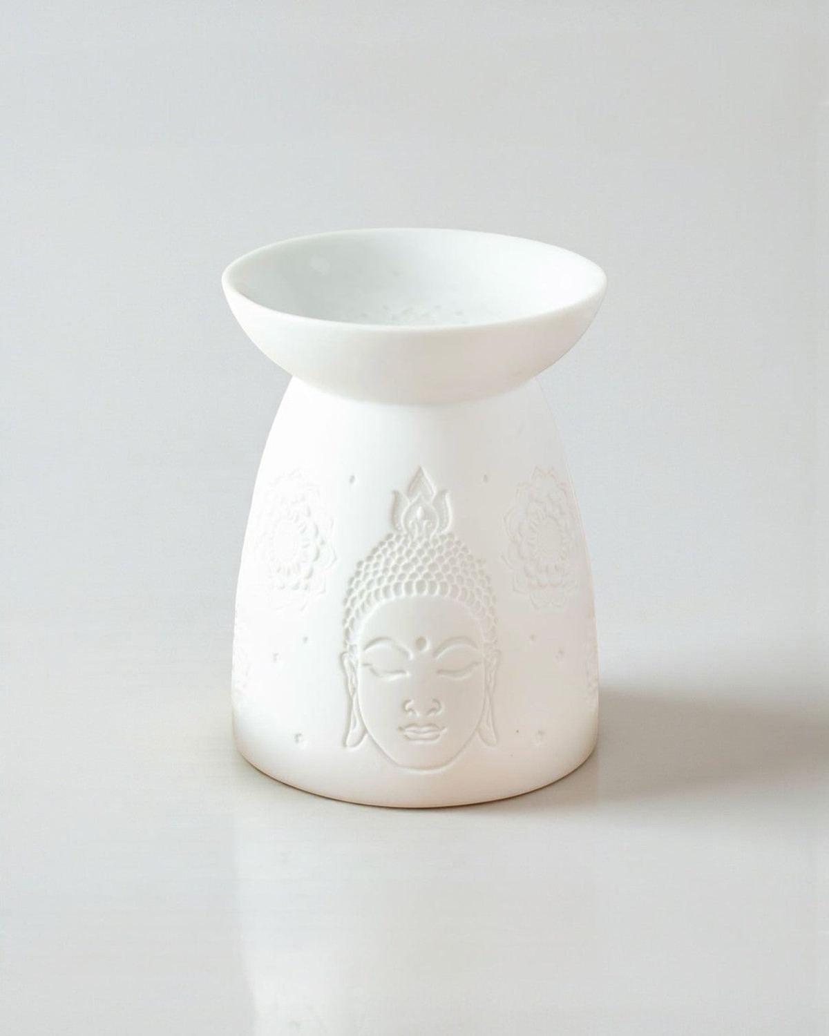 White Buddha wax melt burner by Something Different Wholesale, home fragrance and decor, with a sleek white ceramic finish.