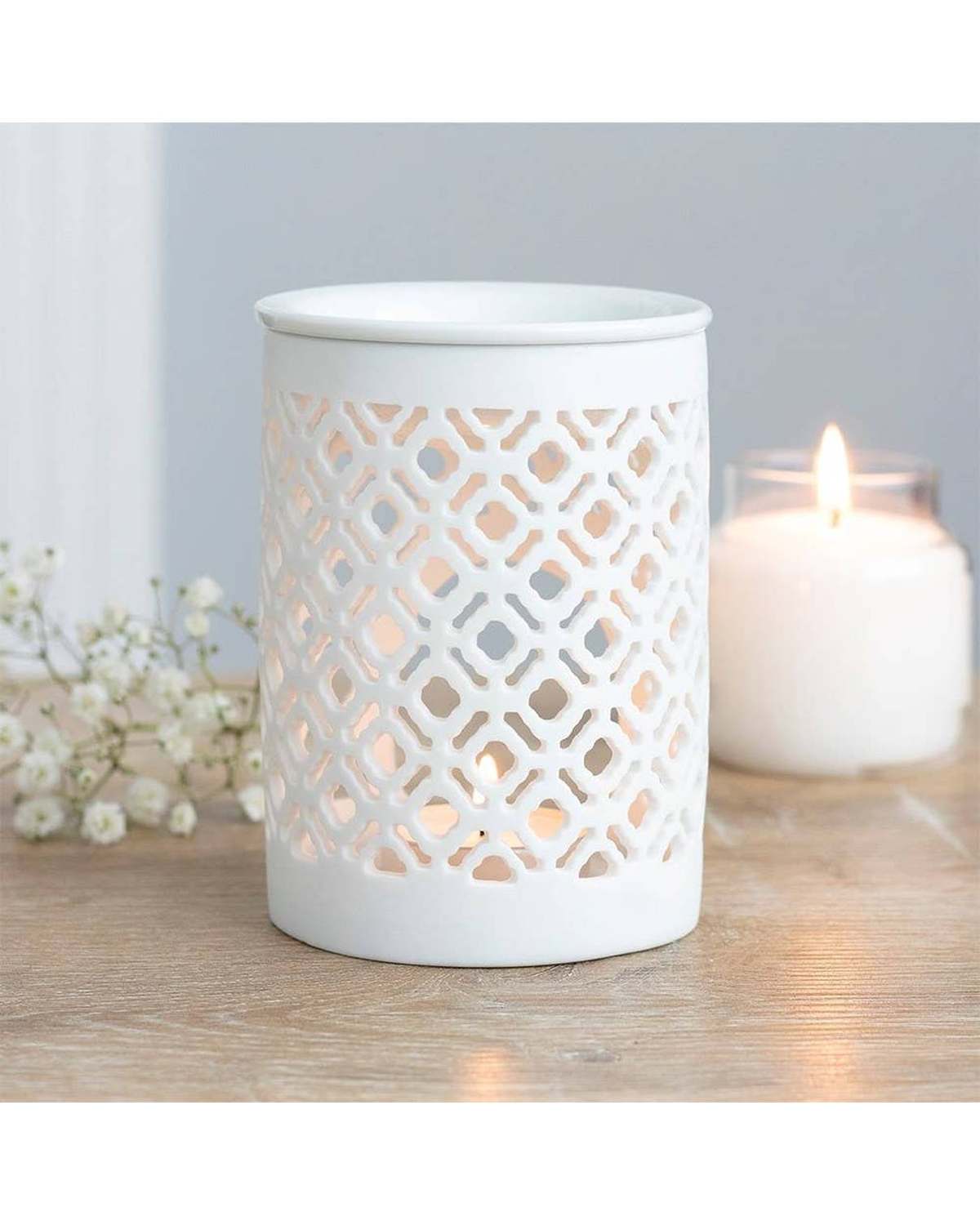 White matte lattice cut oil burner and wax warmer, decorative wax melt burner from Something Different Wholesale.
