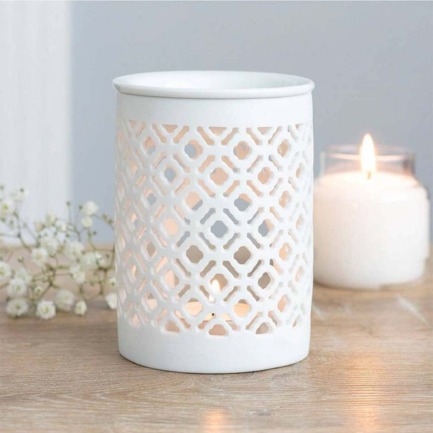 White matte lattice cut oil burner and wax warmer, decorative wax melt burner from Something Different Wholesale.