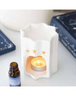 White Star Oil Burner for wax melts, ceramic wax melt burner with star design from Something Different Wholesale