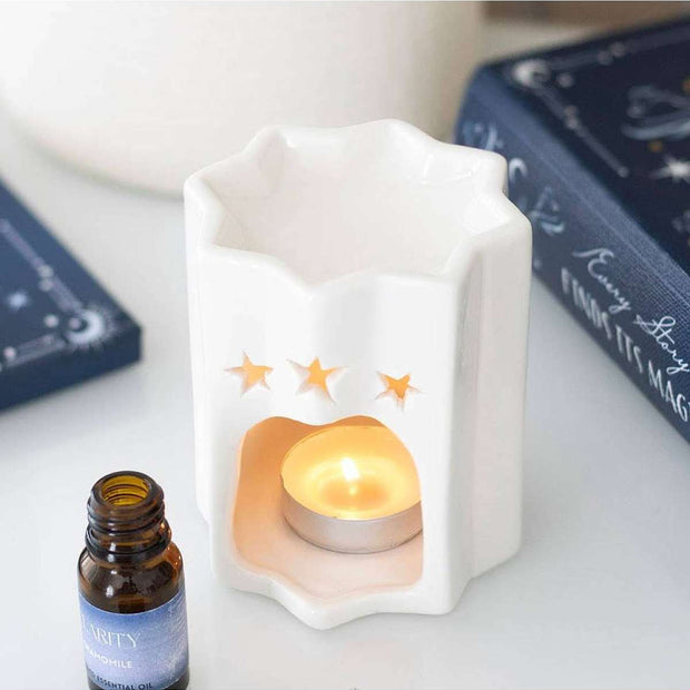 White Star Oil Burner for wax melts, ceramic wax melt burner with star design from Something Different Wholesale