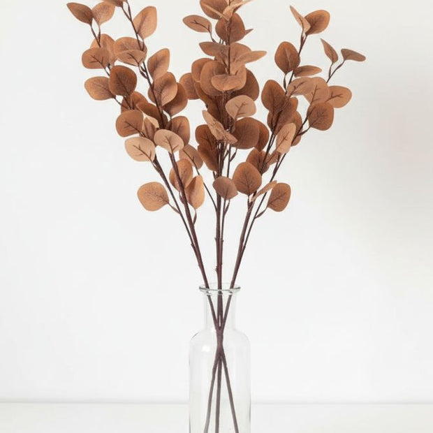 Artificial brown eucalyptus stem from Starlight Express, realistic faux plant with detailed leaves for home decor.