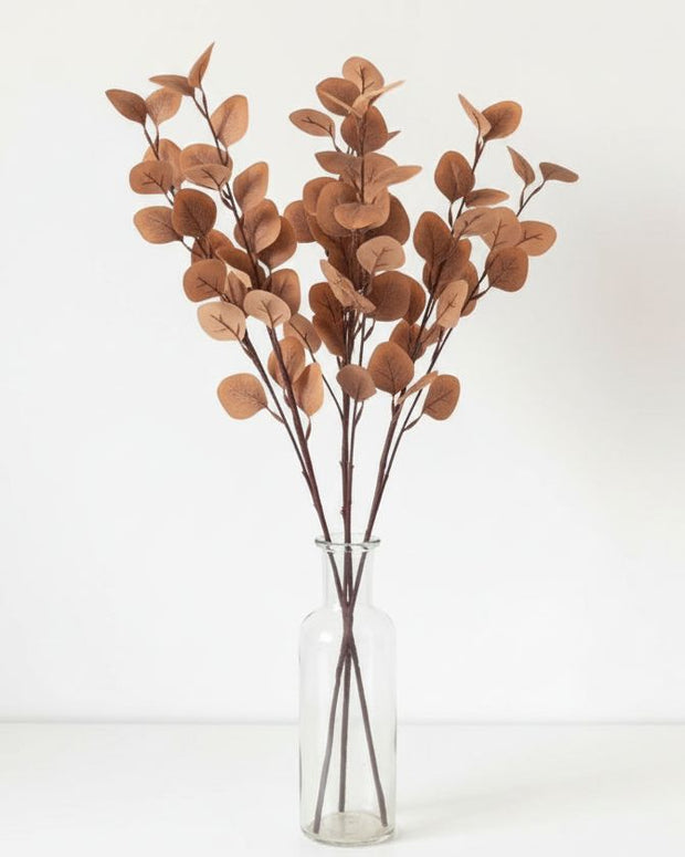 Artificial brown eucalyptus stem from Starlight Express, realistic faux plant with detailed leaves for decorative use.