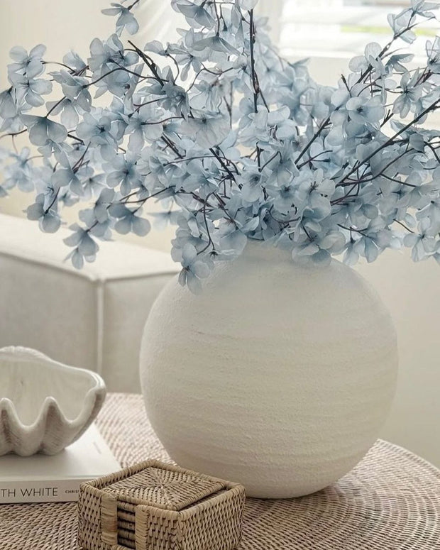 Artificial Ocean Blue Blossom Stem from Starlight Express, realistic blue floral stem for decorative arrangements.