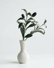 Mini artificial olive branch from Starlight Express with realistic green leaves, ideal for home or office decor.