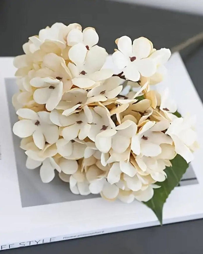 Artificial short soft cream hydrangea stem from Starlight Express, realistic faux floral plant for home decor.