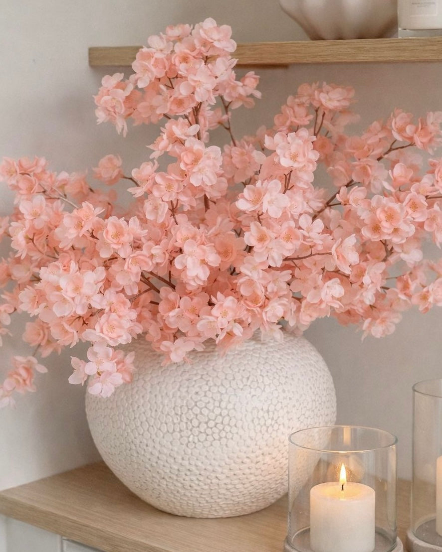Artificial Soft Peach Blossom Stem from Starlight Express, realistic peach-colored flower branch for home decor or floral arrangements.