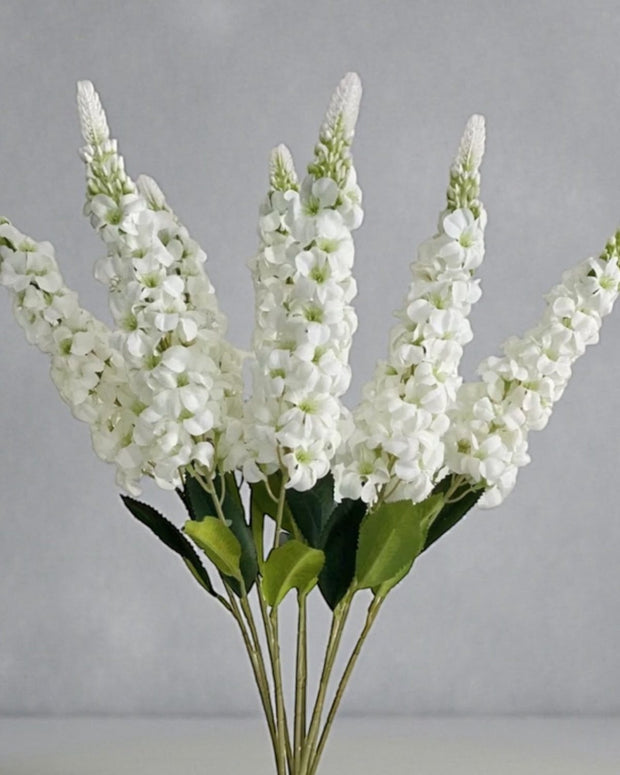Artificial tall white lupin stem from Starlight Express, showcasing realistic white flowers on a long, slender stem.
