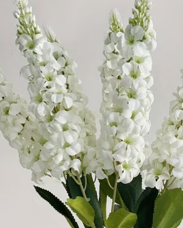 Artificial tall white Lupin stem from Starlight Express, realistic faux plant with delicate white flowers and green foliage.