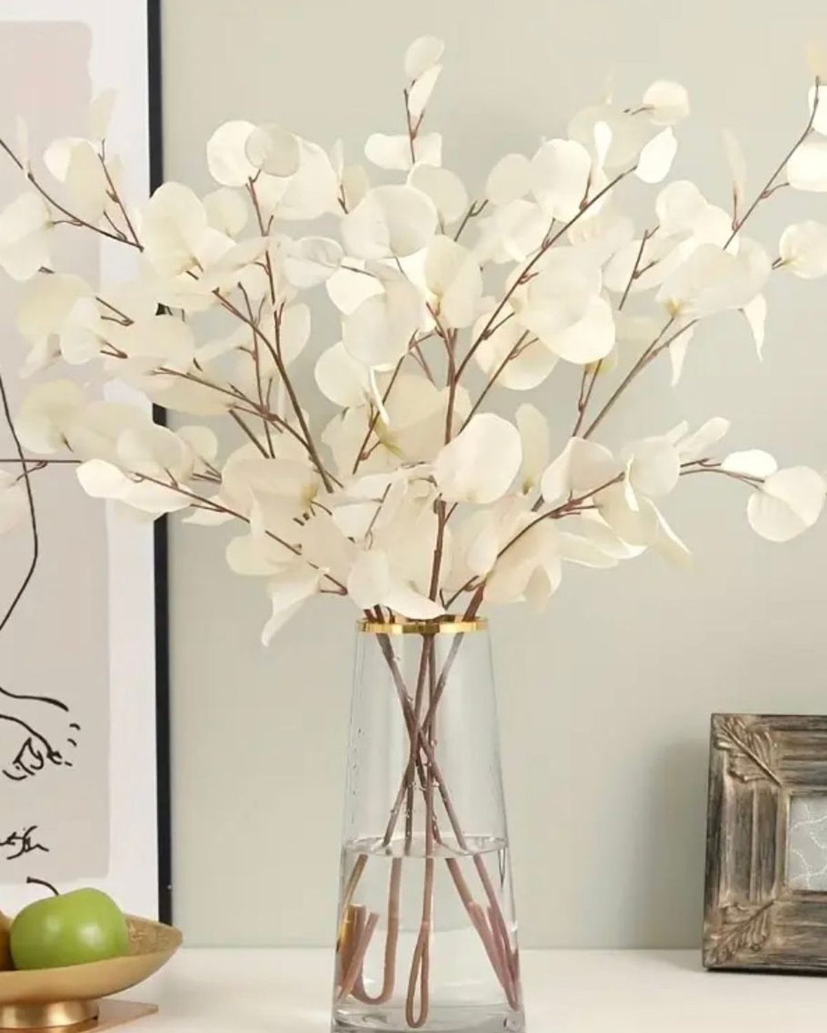 Artificial white eucalyptus stem from Starlight Express, showcasing realistic white eucalyptus leaves on a natural-looking stem.