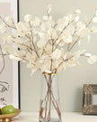 Artificial white eucalyptus stem from Starlight Express, showcasing realistic white eucalyptus leaves on a natural-looking stem.