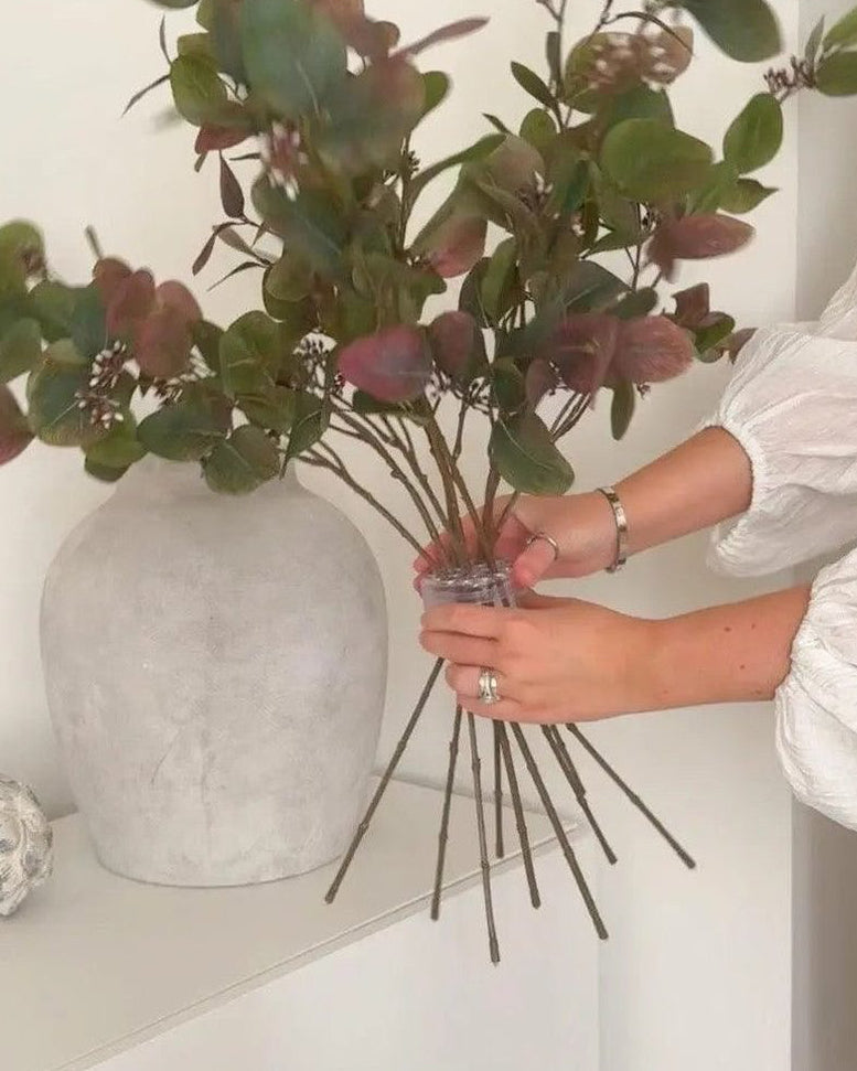 Set of two Starlight Express Flower Stem Styler Twister artificial plants with spiral flower holders on a neutral background.
