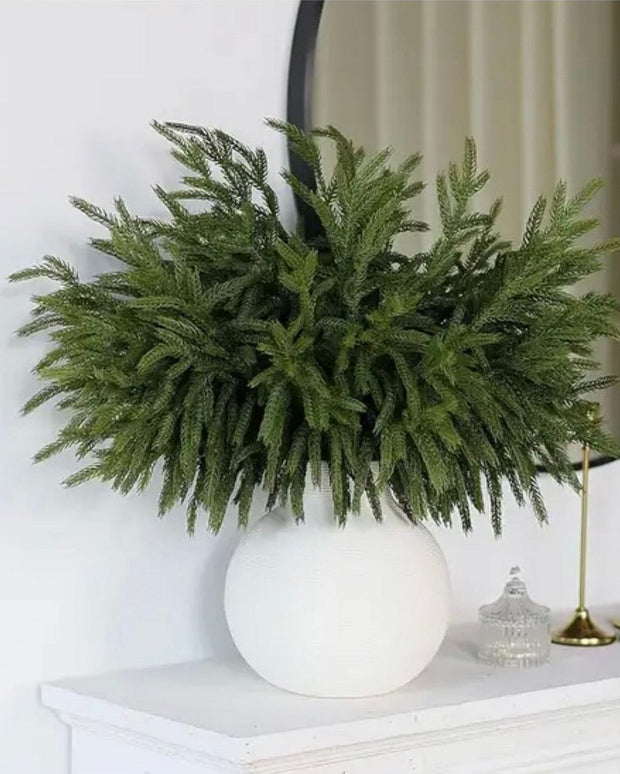 Artificial luxury green spruce Norfolk stem for Christmas décor, by Starlight Express, showcasing lush green needle details.