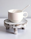 Set of three white washed round risers for home decor by Starlight Express, perfect for displaying vases or decorative items.