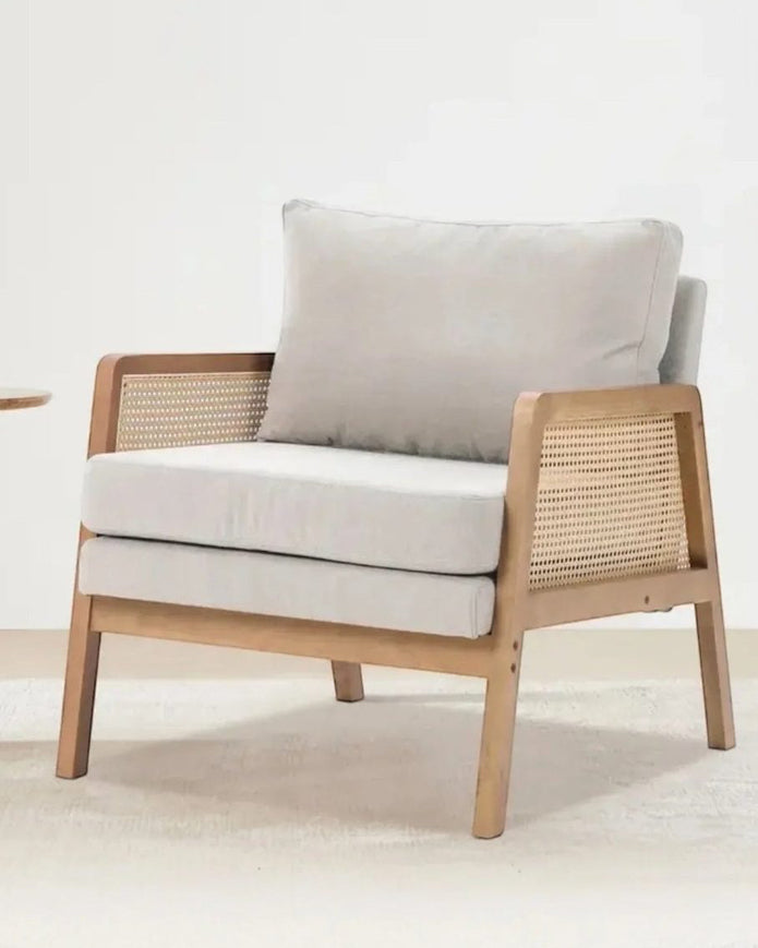 Starlight Express Compton natural framed rattan armchair with beige linen upholstery, showcasing stylish furniture design.